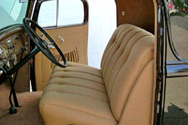 Antique car interior restored by Barry Seat Covers.