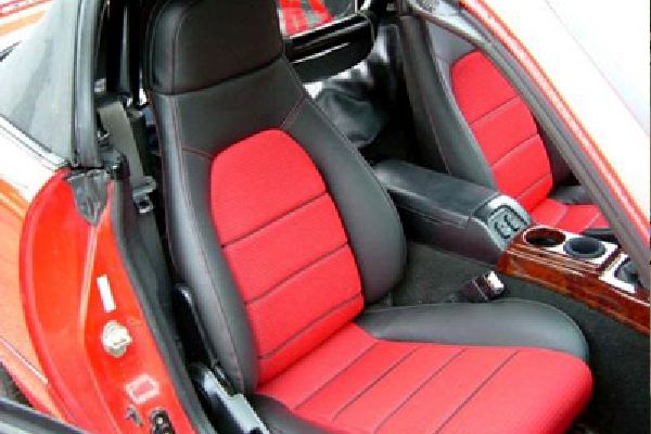 Sports car seats recovered by Barry Seat.